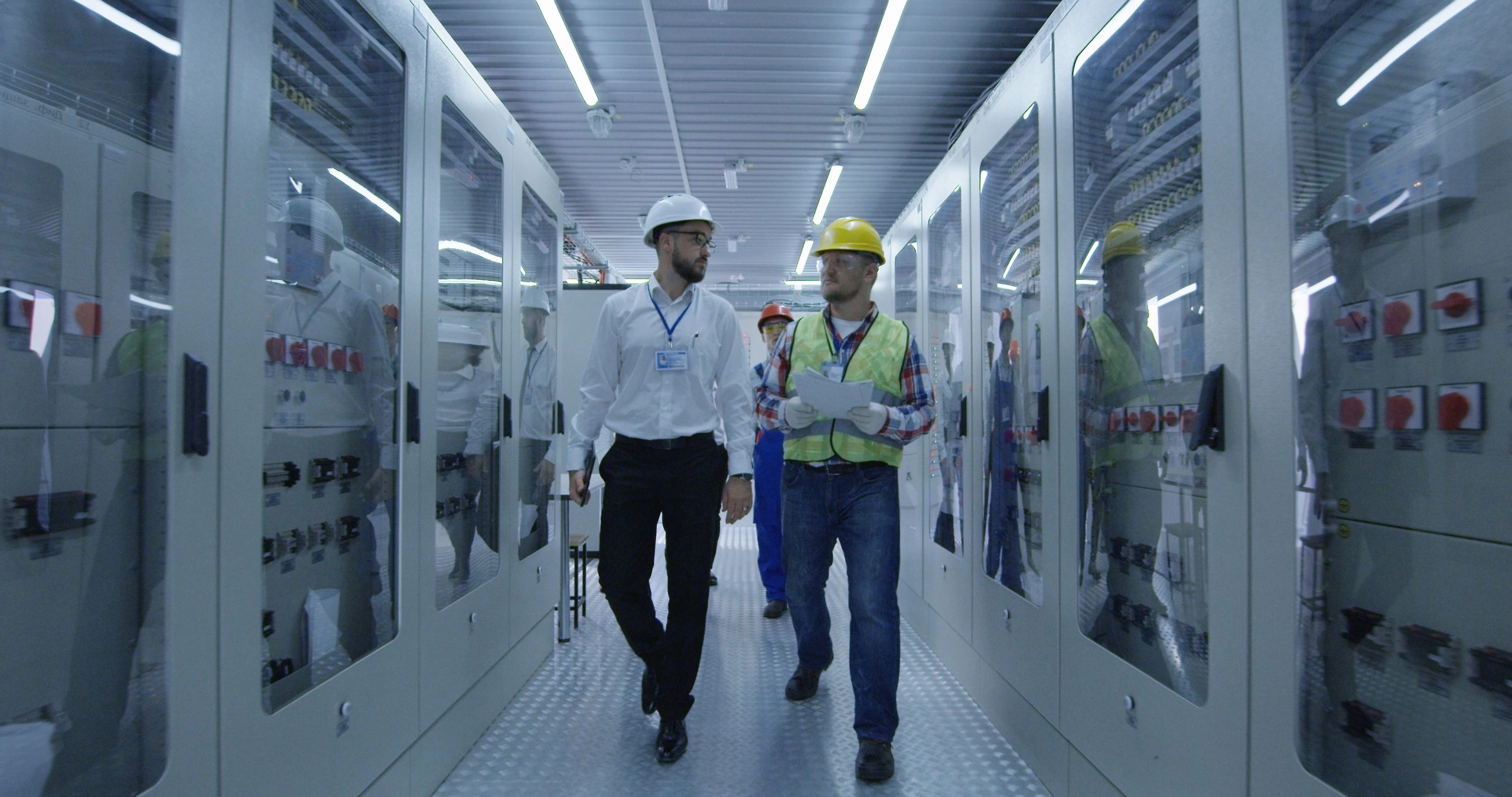 Service professionals walking through a commercial property review